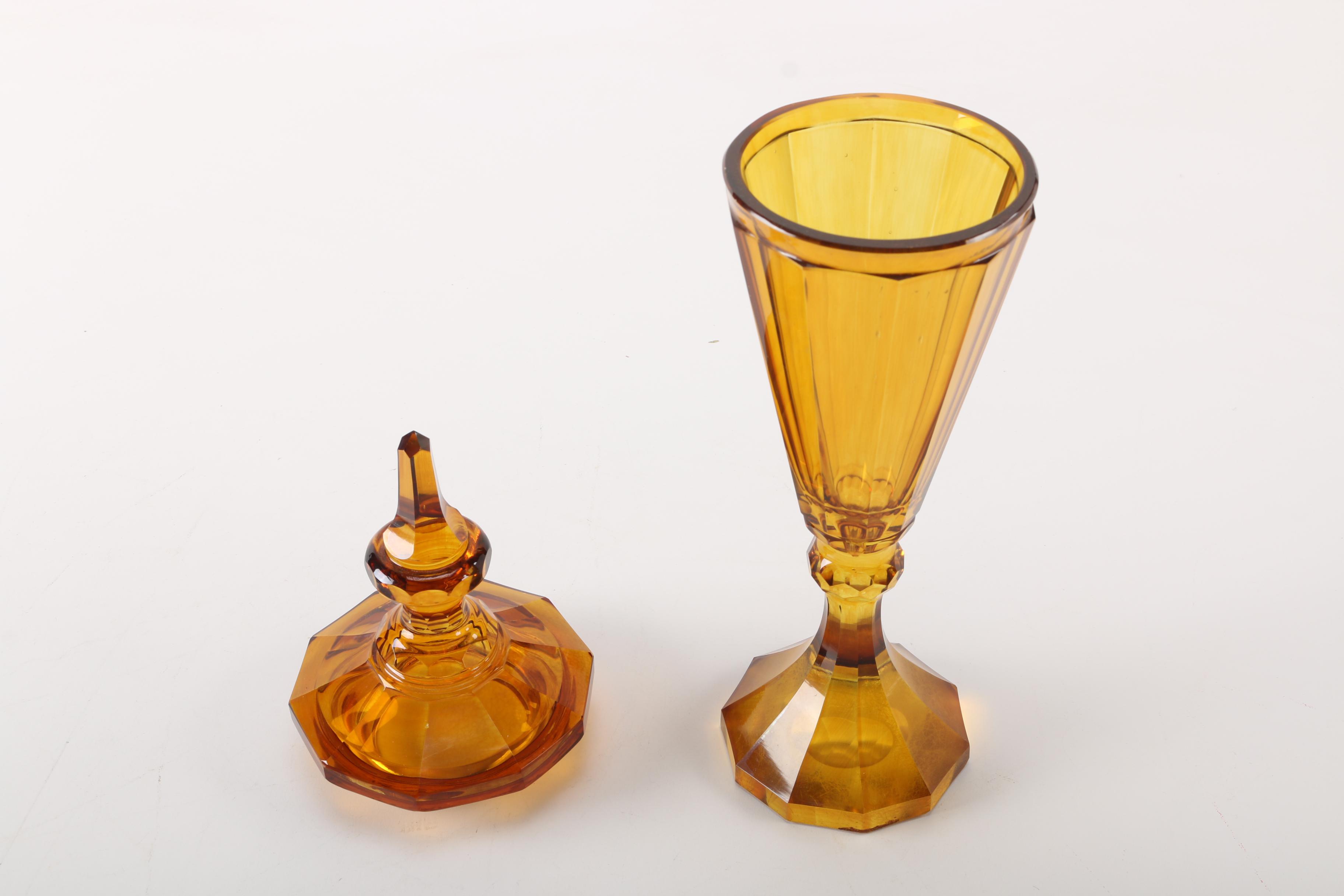 Pair of Amber-Colored Glass Lidded Urns