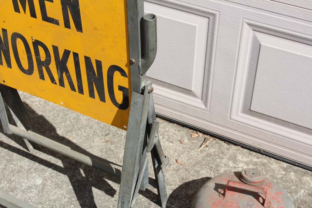 Vintage Metal "Men Working" Sign With Gas Can