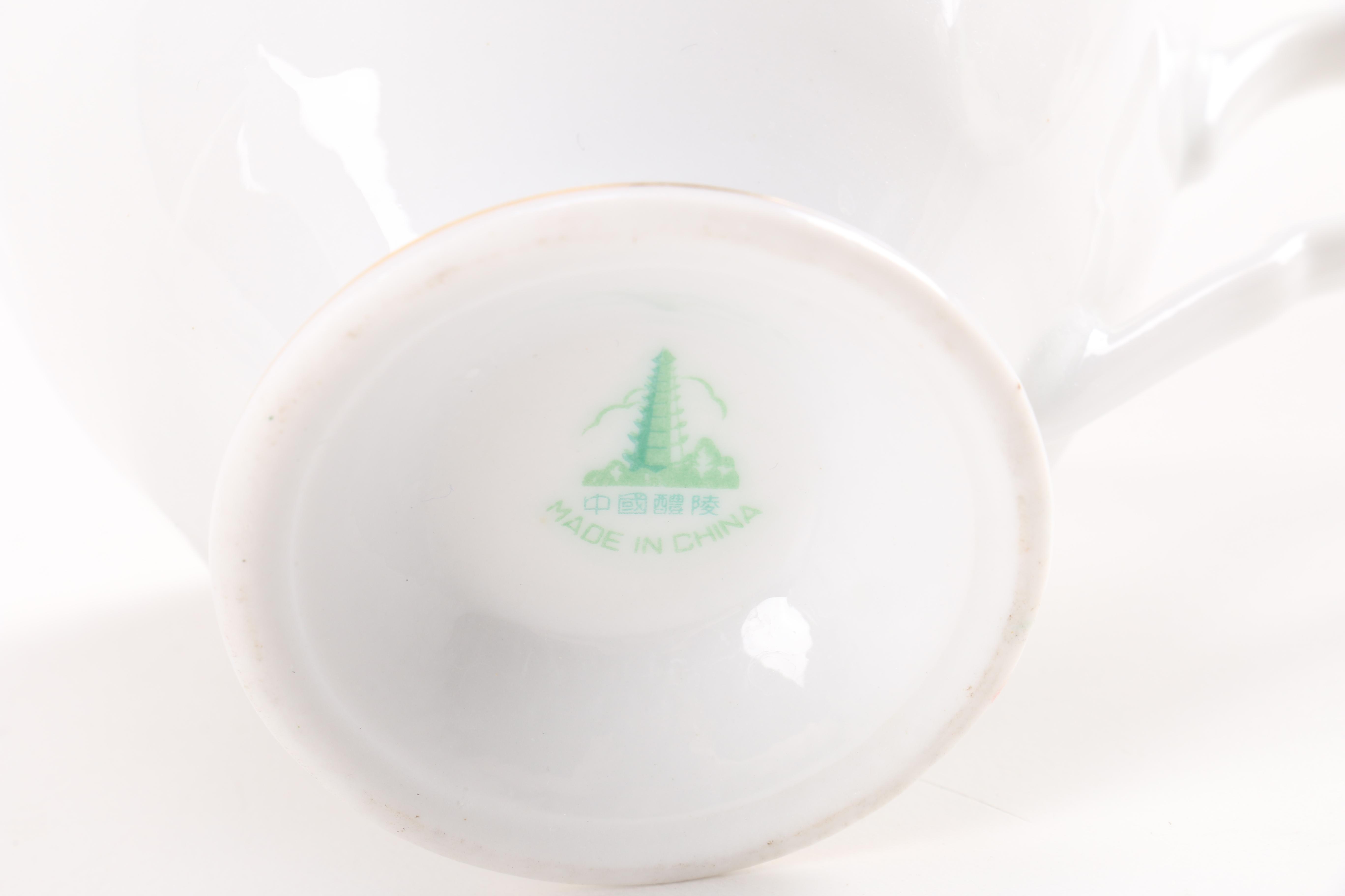 Assortment of Teacups and Saucers
