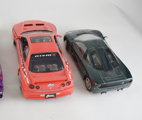 Five Die-Cast Model Cars