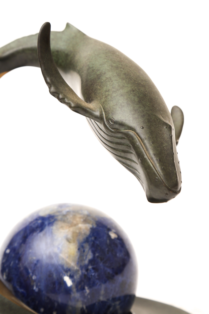 Metal Whale With Globe Like Stone Sphere