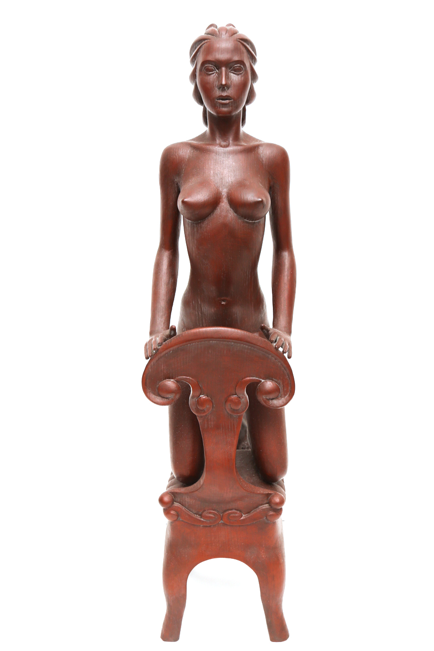 Hand Carved Sculpture Of A Female Kneeling