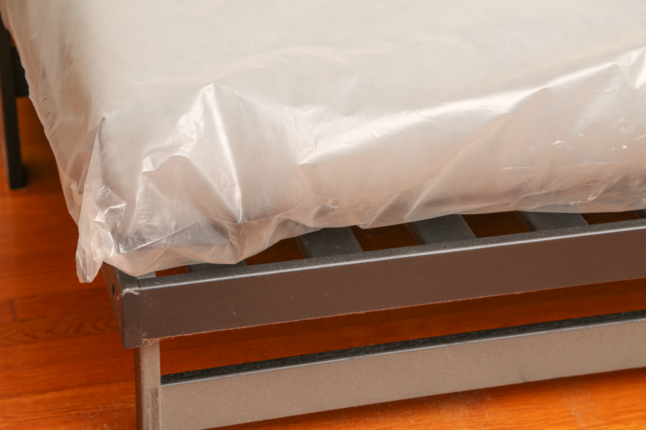 Black Wooden Futon With Grey Microsuede Cushions