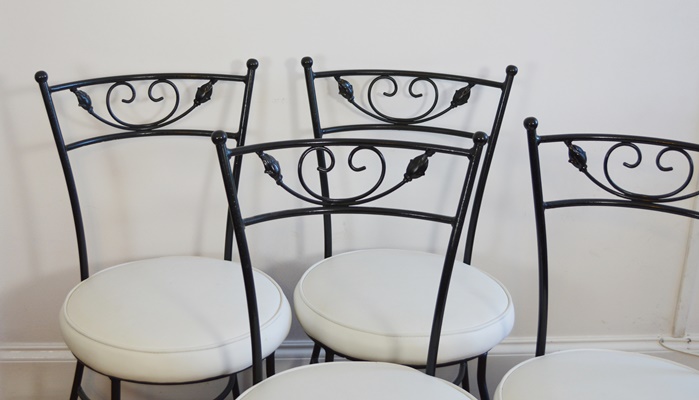 Four Metal Bistro Chairs
