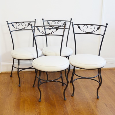 Four Metal Bistro Chairs