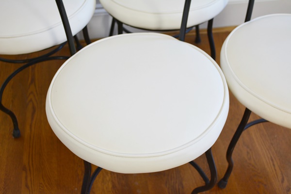 Four Metal Bistro Chairs