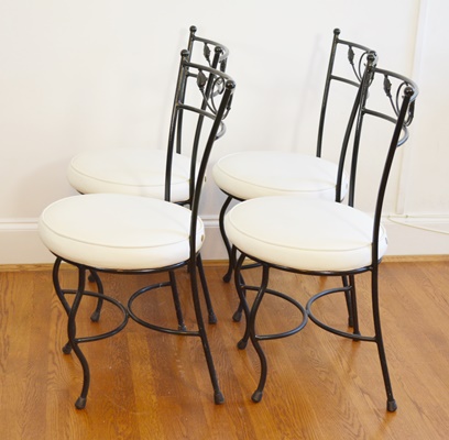 Four Metal Bistro Chairs