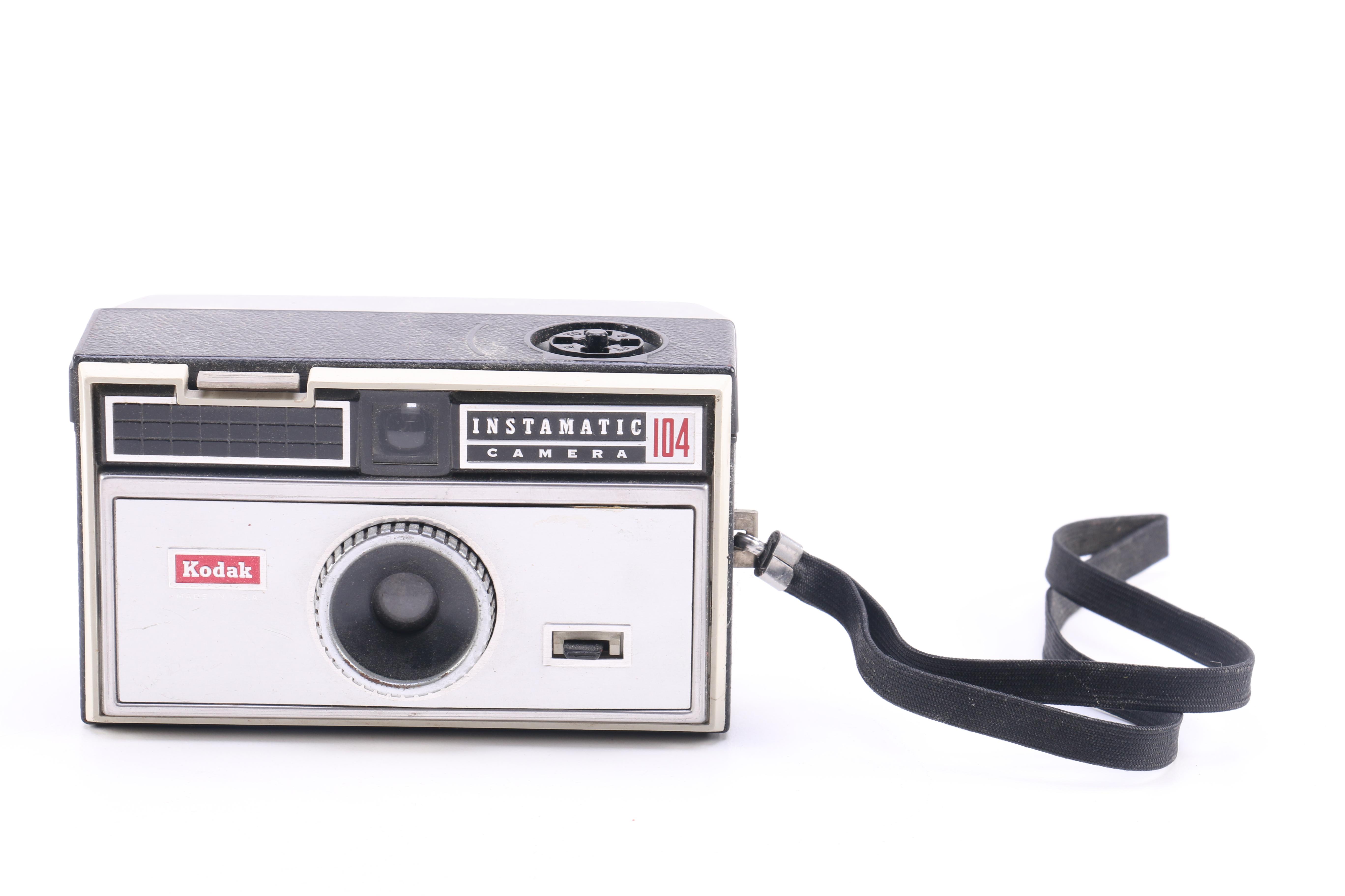 Assortment of Vintage Kodak Cameras and Accessories