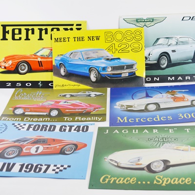 Seven Vintage Race Car Advertising Signs