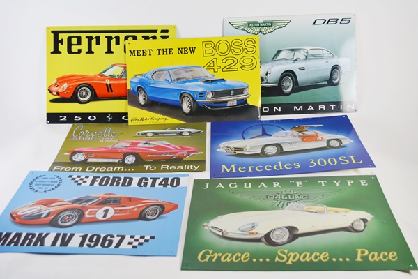 Seven Vintage Race Car Advertising Signs