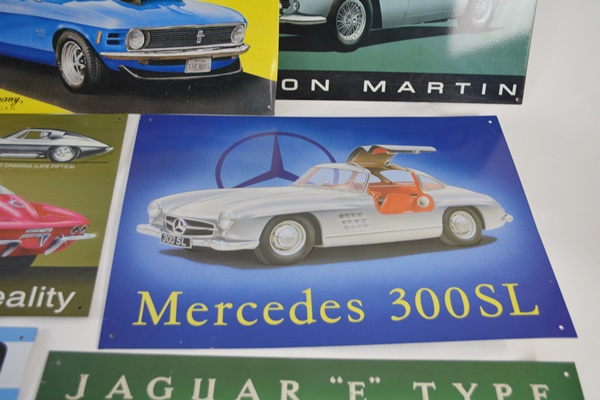 Seven Vintage Race Car Advertising Signs