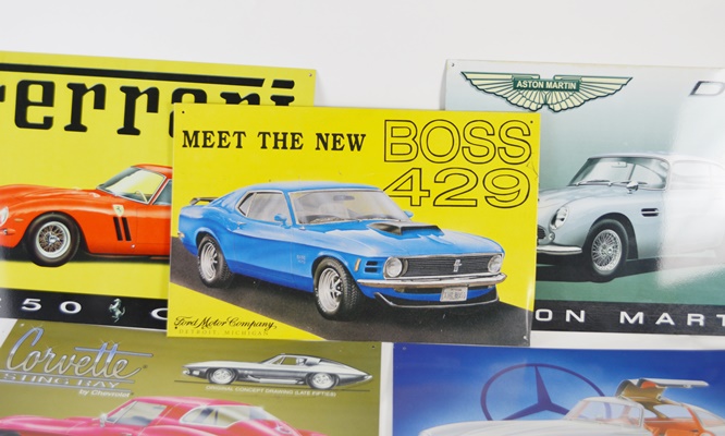 Seven Vintage Race Car Advertising Signs