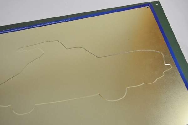 Seven Vintage Race Car Advertising Signs