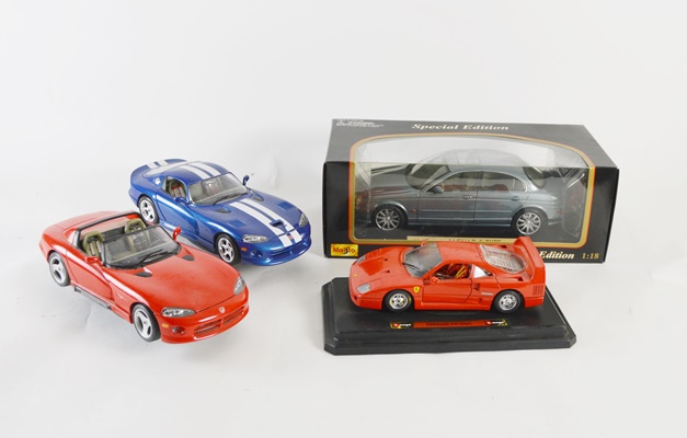 Four Die-Cast Model Cars