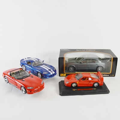 Four Die-Cast Model Cars