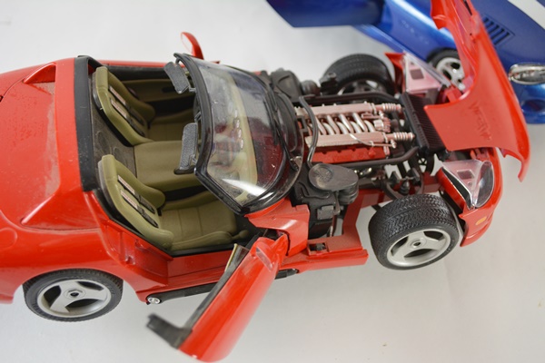 Four Die-Cast Model Cars