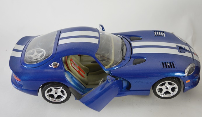 Four Die-Cast Model Cars