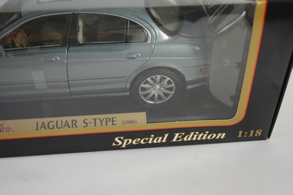 Four Die-Cast Model Cars