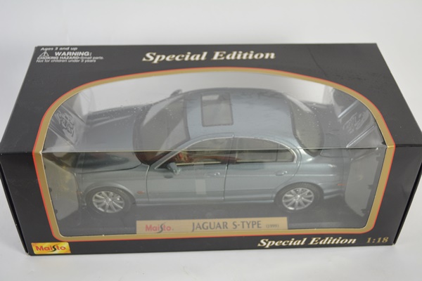 Four Die-Cast Model Cars