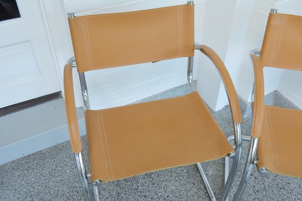 Pair of Mid Century Modern Faux Leather and Chrome Chairs