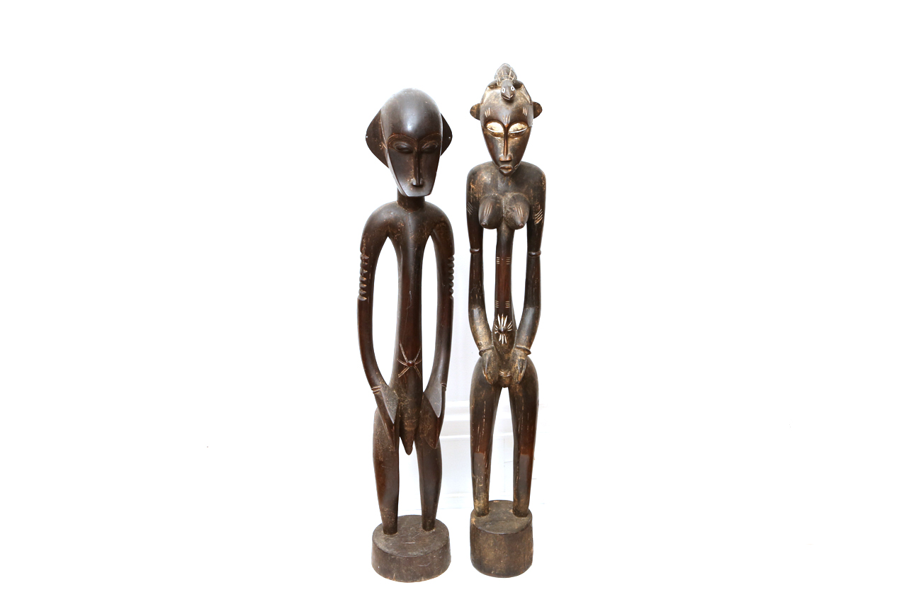Hand Carved African Male And Female Sculptures