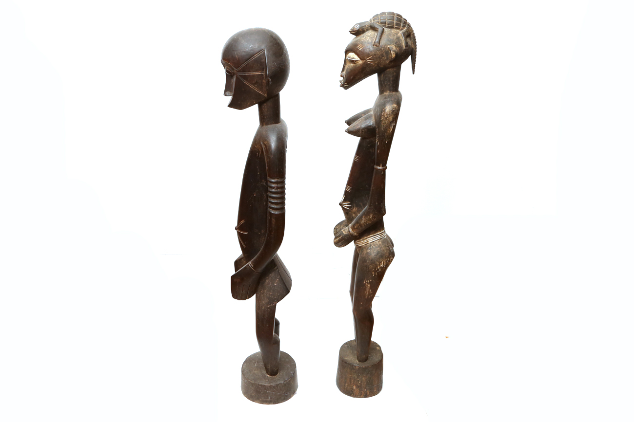 Hand Carved African Male And Female Sculptures