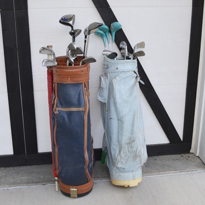 Two Sets of Golf Clubs and Golf Bags
