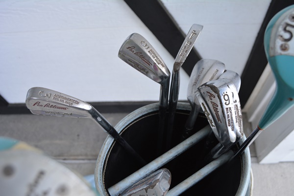 Two Sets of Golf Clubs and Golf Bags