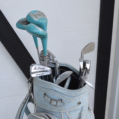 Two Sets of Golf Clubs and Golf Bags