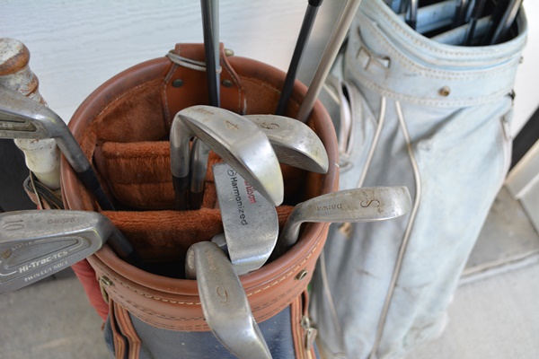 Two Sets of Golf Clubs and Golf Bags