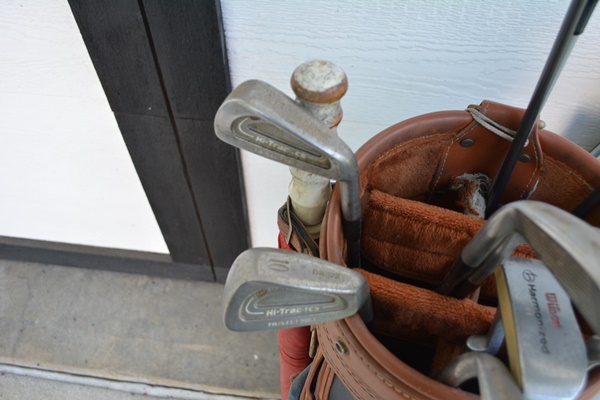 Two Sets of Golf Clubs and Golf Bags