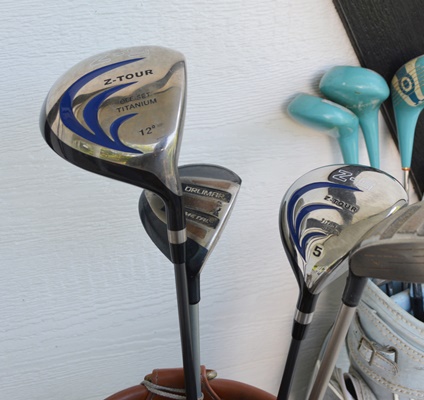 Two Sets of Golf Clubs and Golf Bags