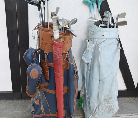 Two Sets of Golf Clubs and Golf Bags