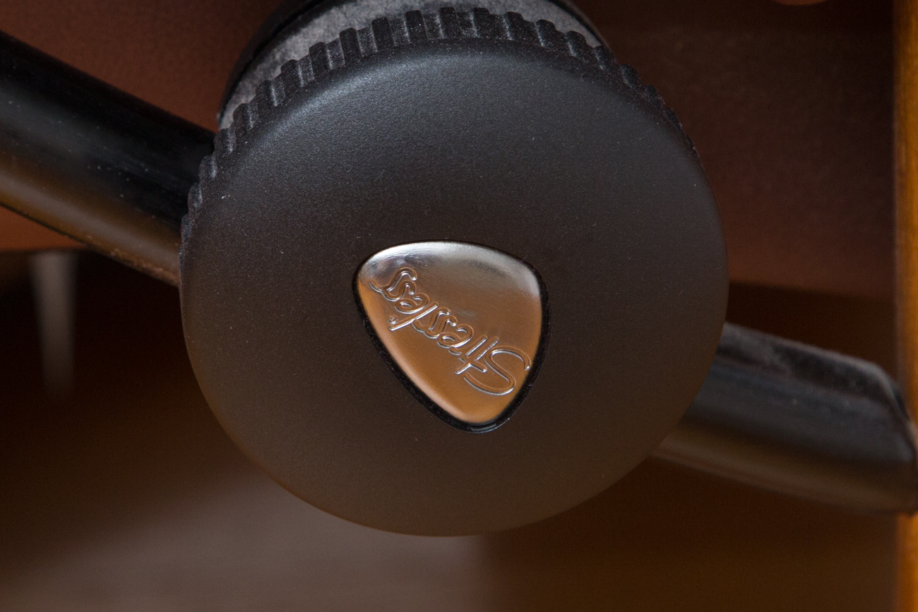 Bova Modern Brown Leather Armchair And Footstool