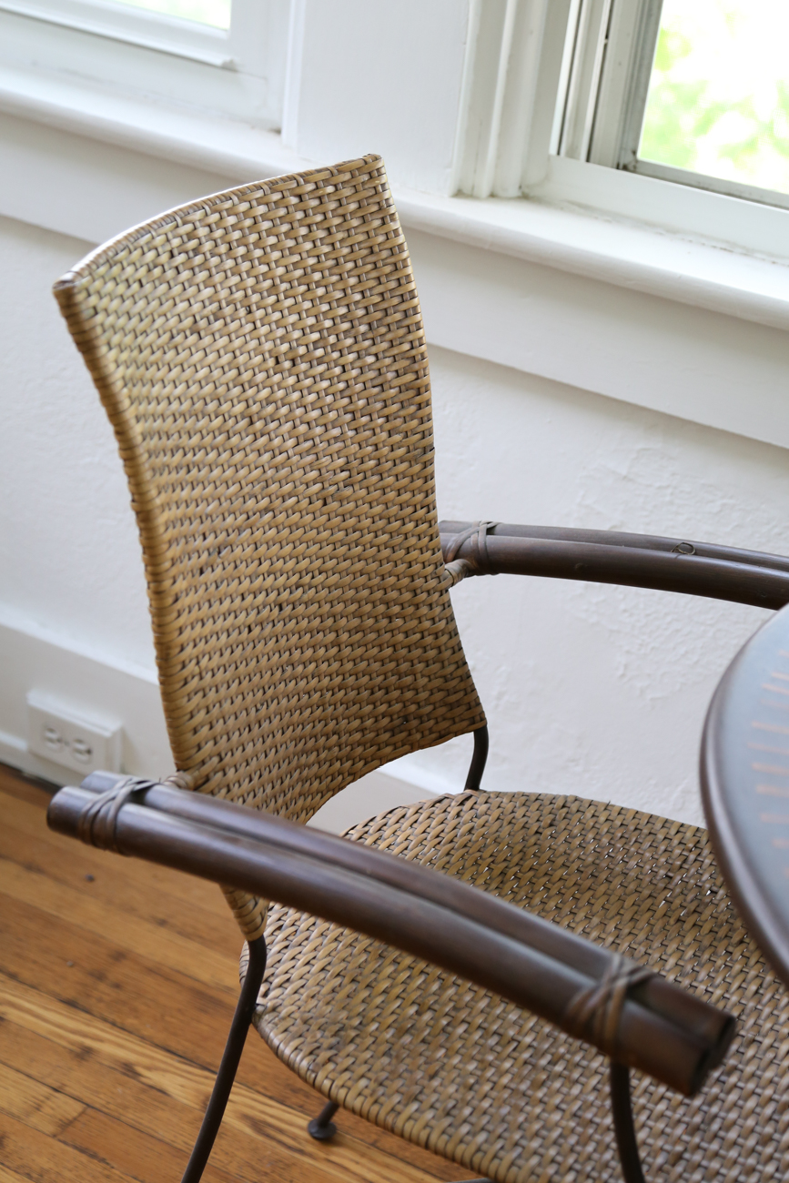 Metal Bistro Table With Two Rattan Chairs
