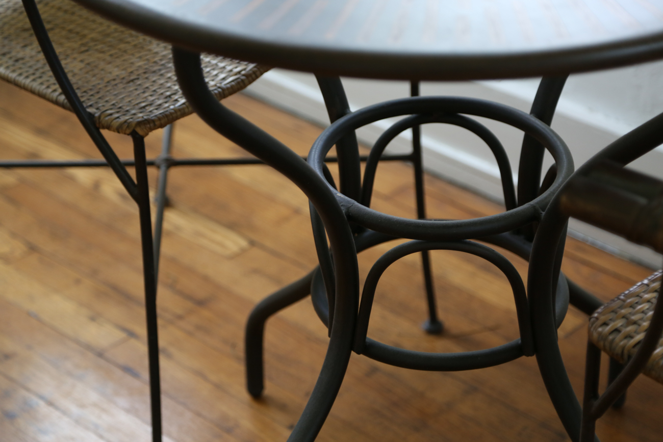 Metal Bistro Table With Two Rattan Chairs