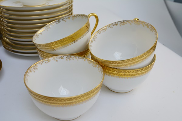 Ten Place Settings of Limoges Gold and White China