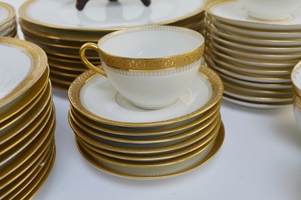 Ten Place Settings of Limoges Gold and White China