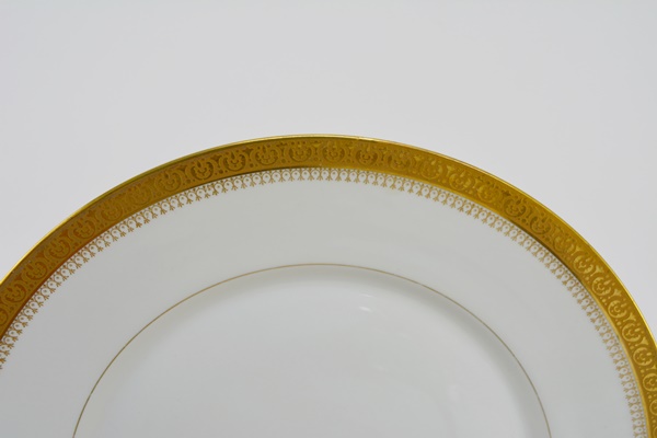 Ten Place Settings of Limoges Gold and White China