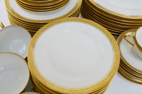 Ten Place Settings of Limoges Gold and White China