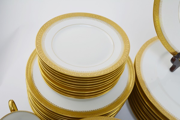 Ten Place Settings of Limoges Gold and White China