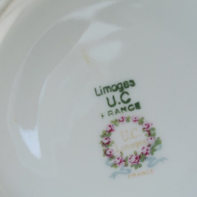 Ten Place Settings of Limoges Gold and White China