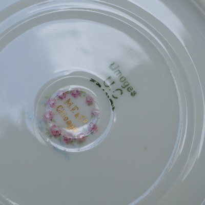 Ten Place Settings of Limoges Gold and White China