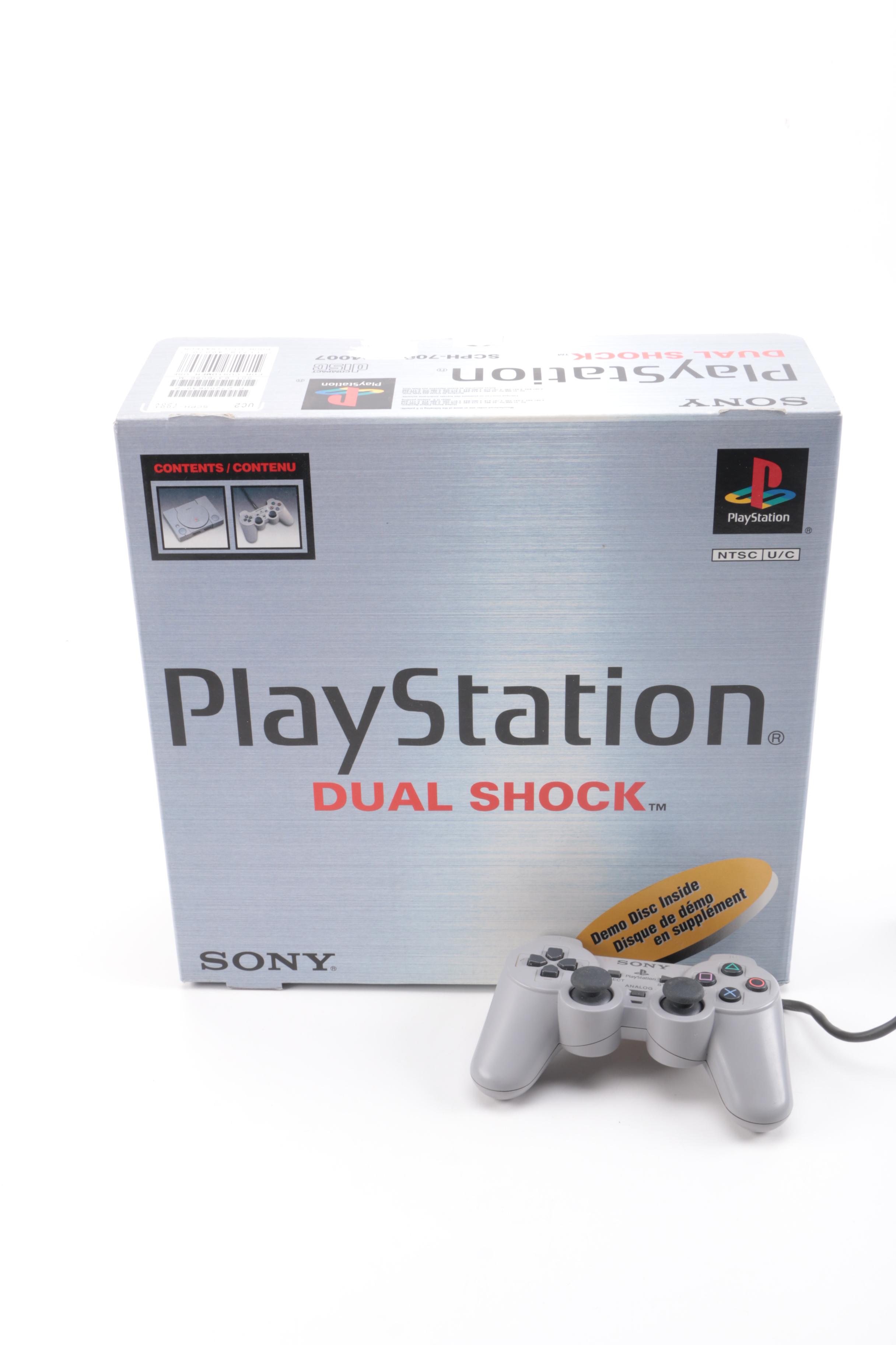 1990s Sony PlayStation SCPH-7001 with Mad Catz Accessories