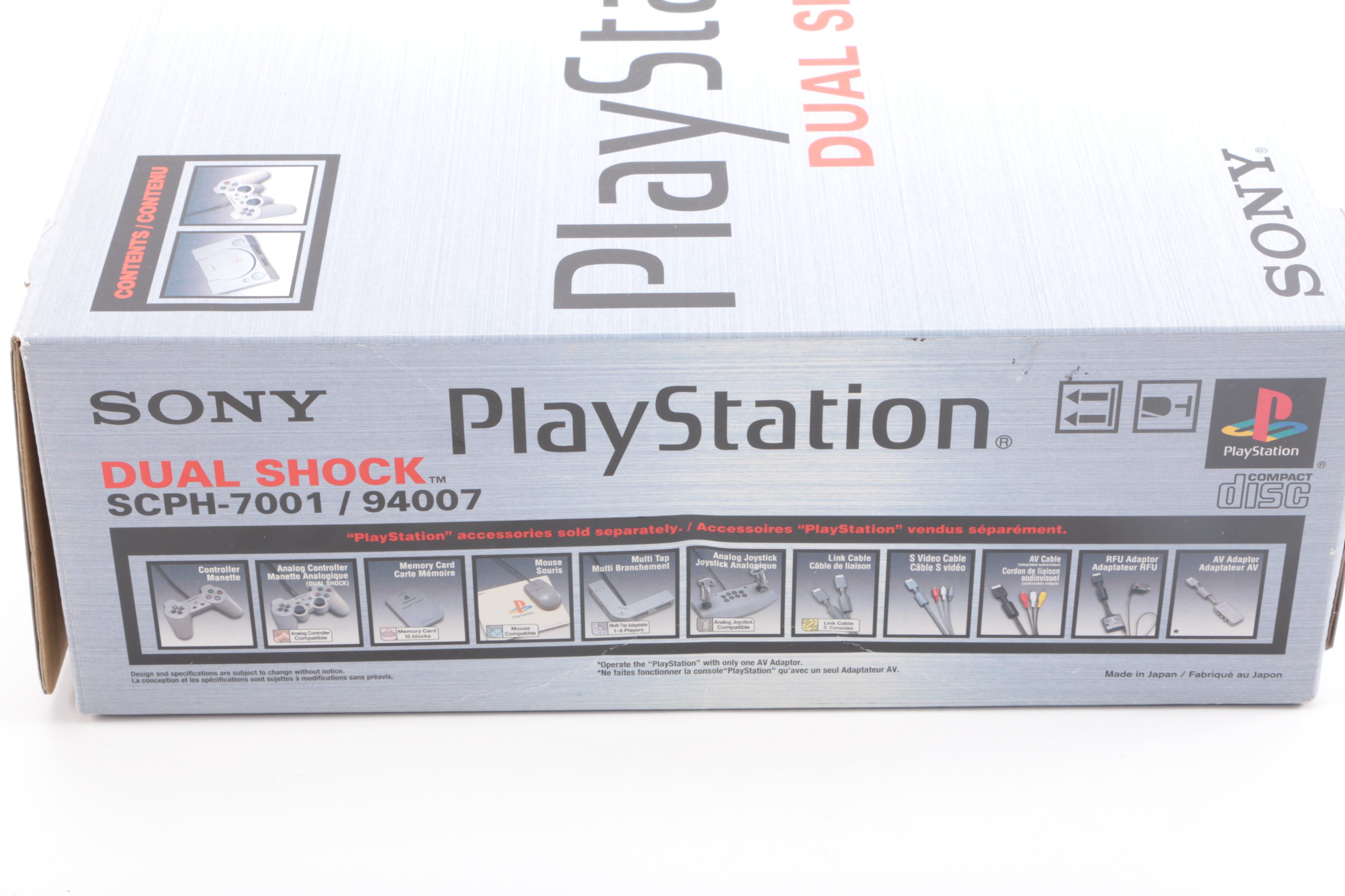 1990s Sony PlayStation SCPH-7001 with Mad Catz Accessories