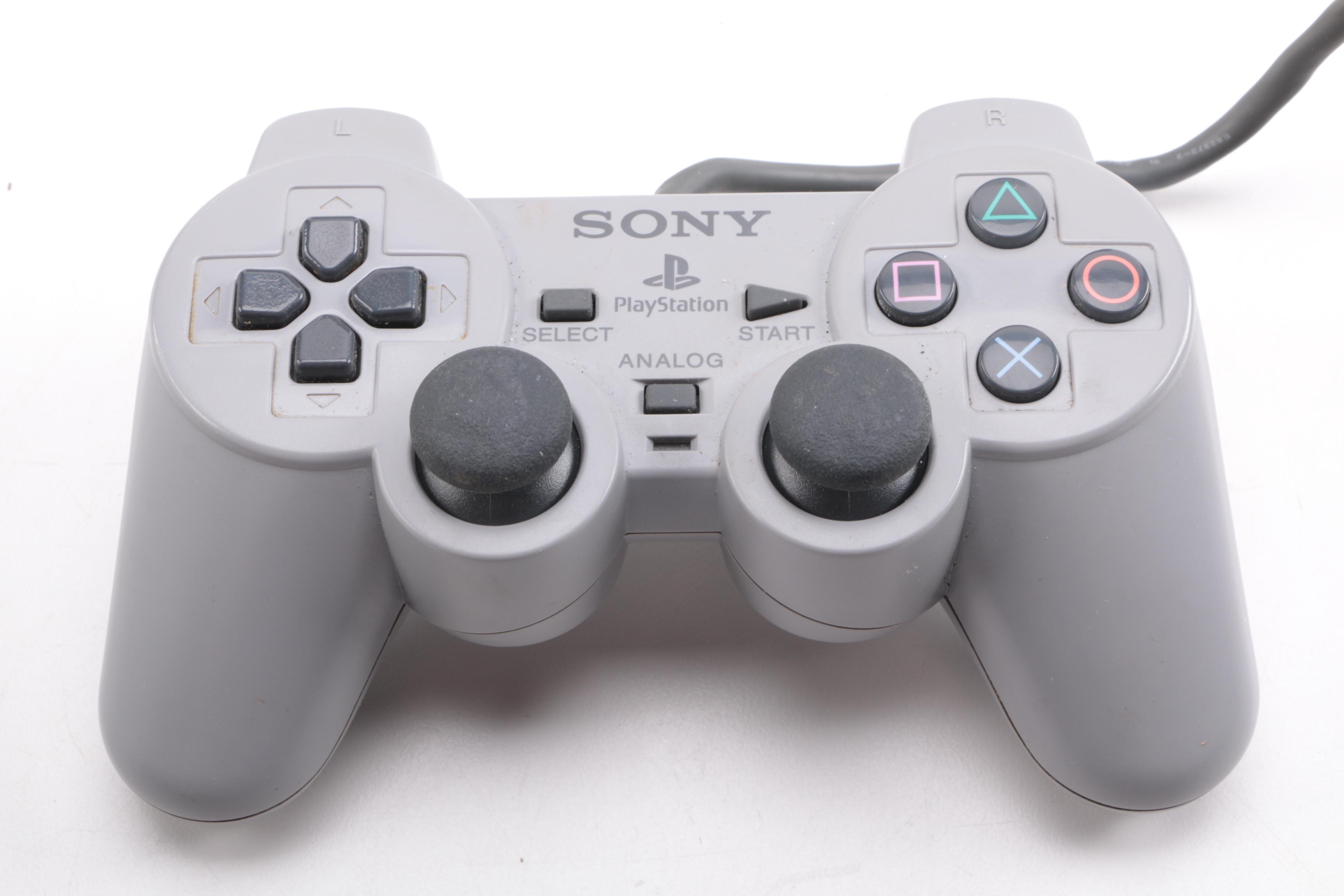 1990s Sony PlayStation SCPH-7001 with Mad Catz Accessories