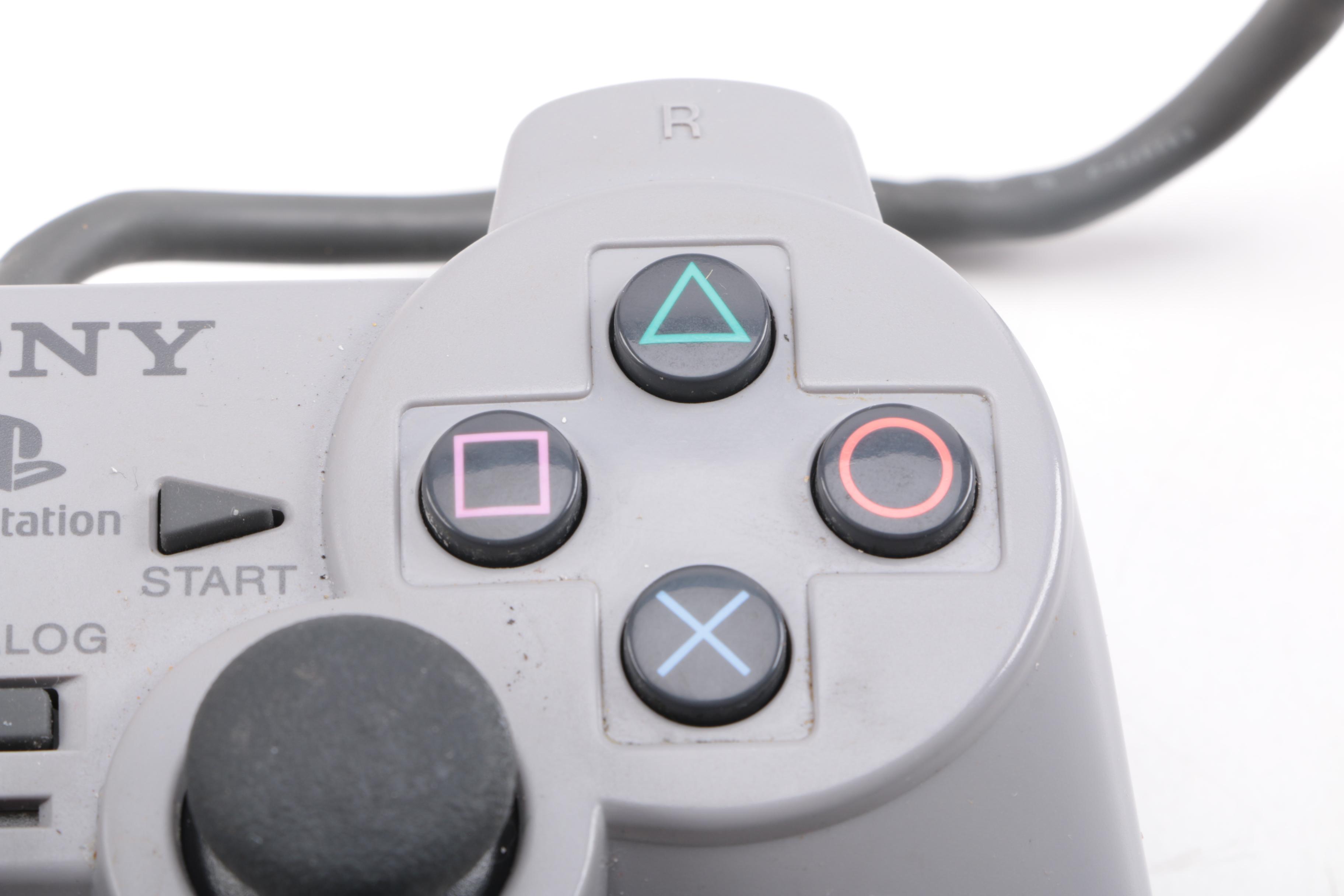 1990s Sony PlayStation SCPH-7001 with Mad Catz Accessories