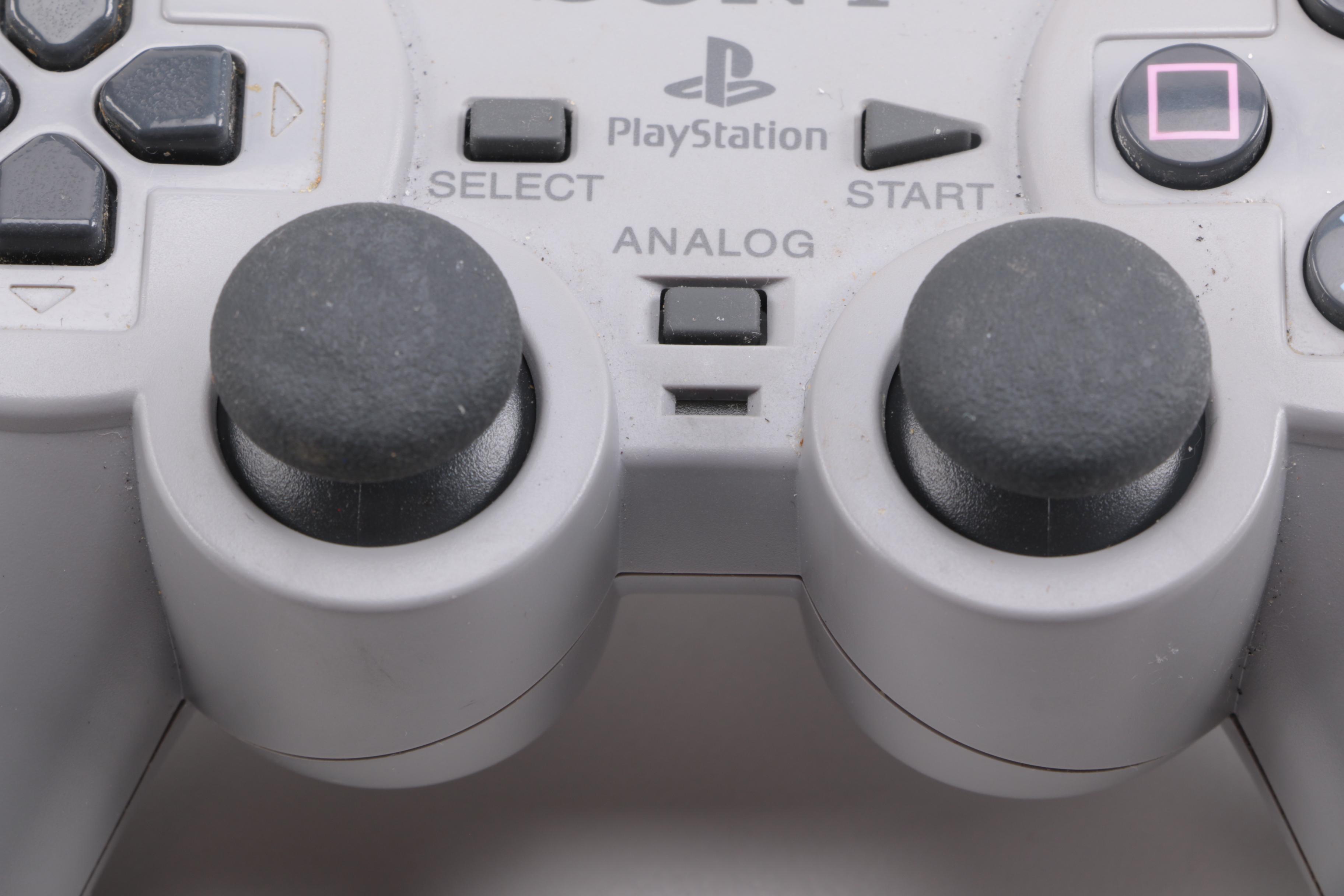 1990s Sony PlayStation SCPH-7001 with Mad Catz Accessories