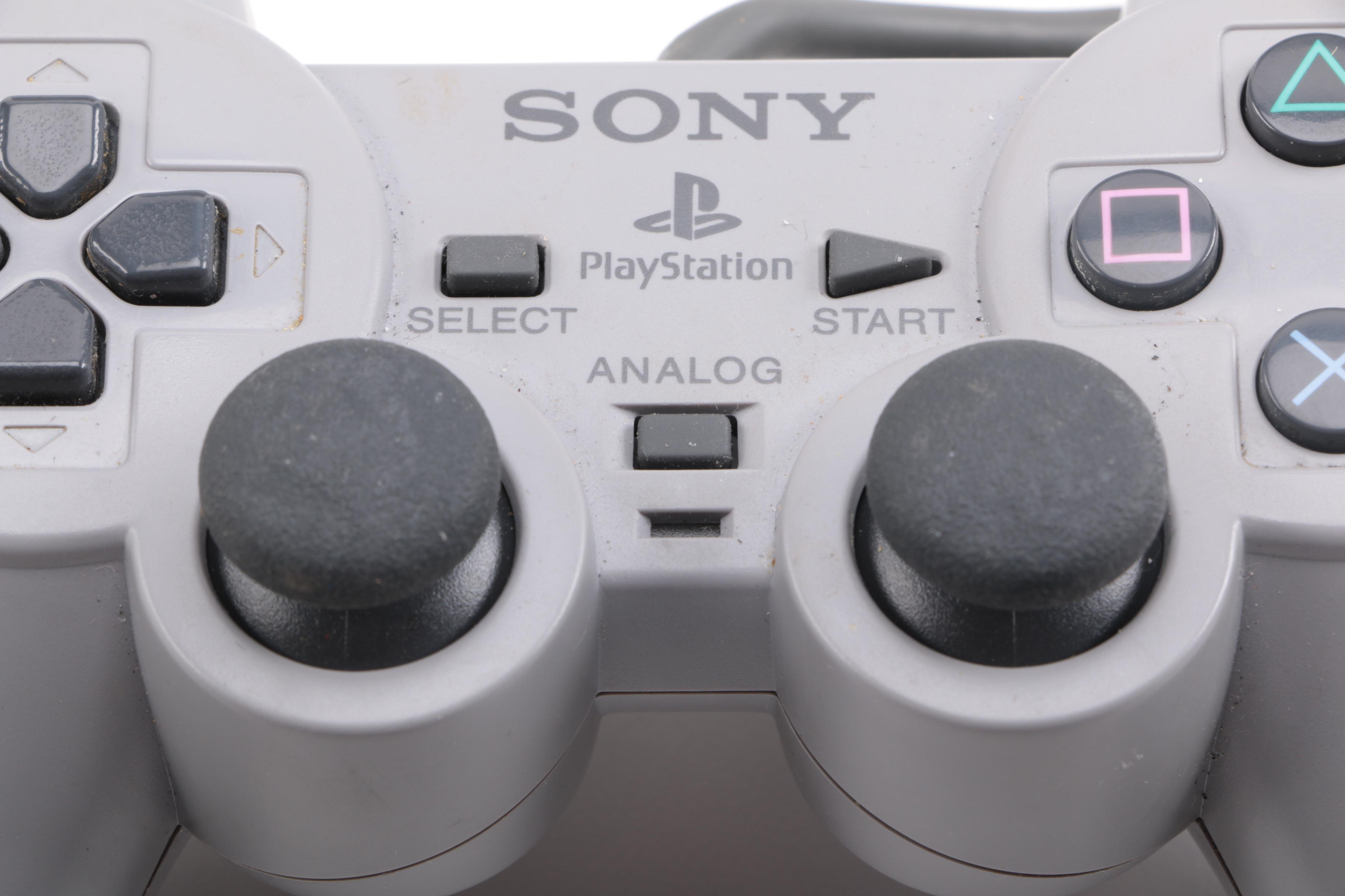 1990s Sony PlayStation SCPH-7001 with Mad Catz Accessories