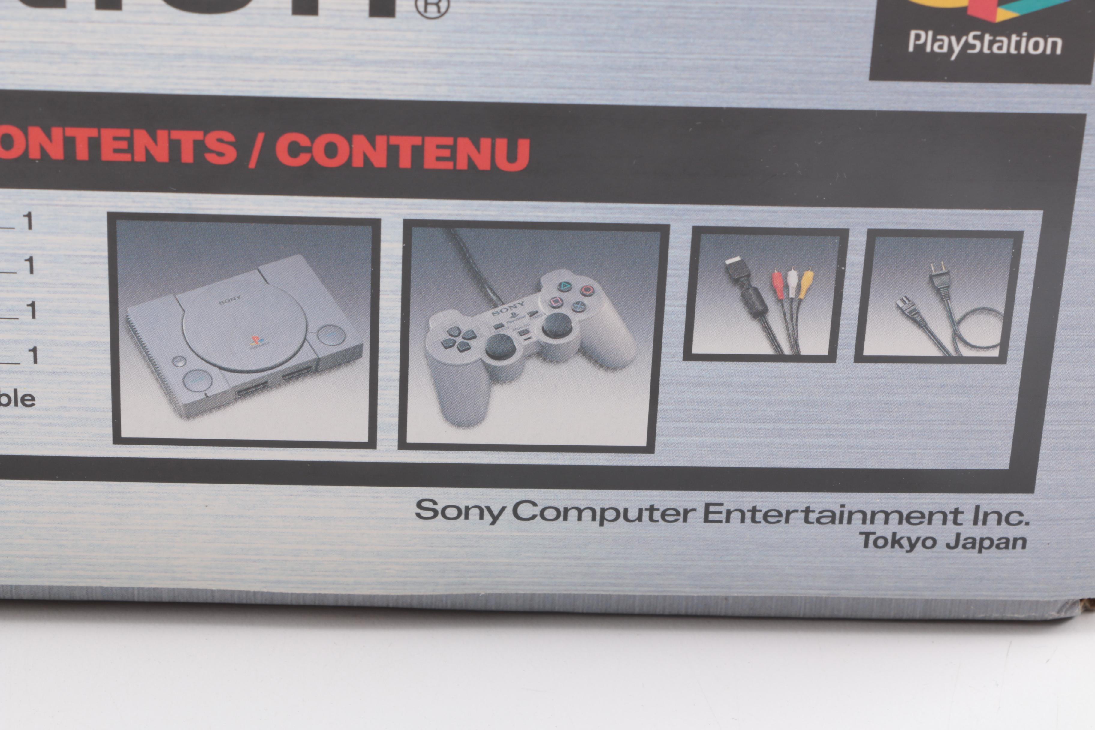 1990s Sony PlayStation SCPH-7001 with Mad Catz Accessories